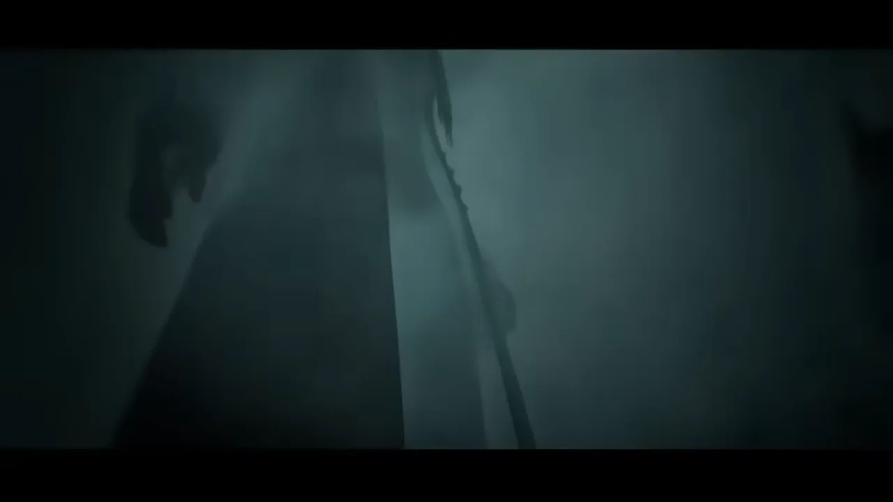 Pale giant figure looming in sea fog