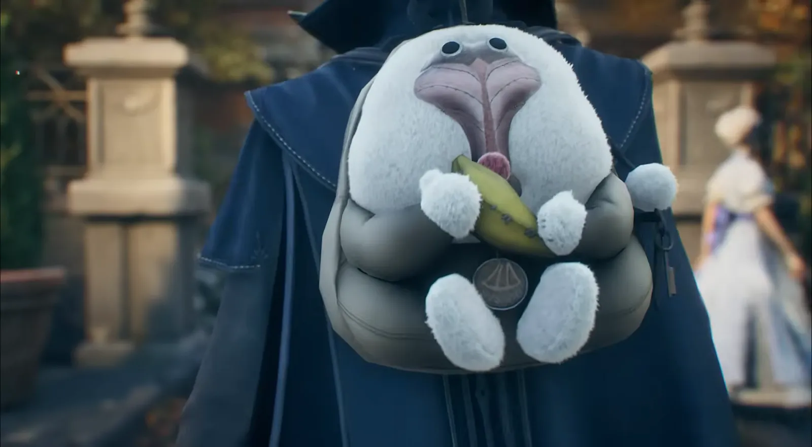Close-up of a plush rabbit holding a coin